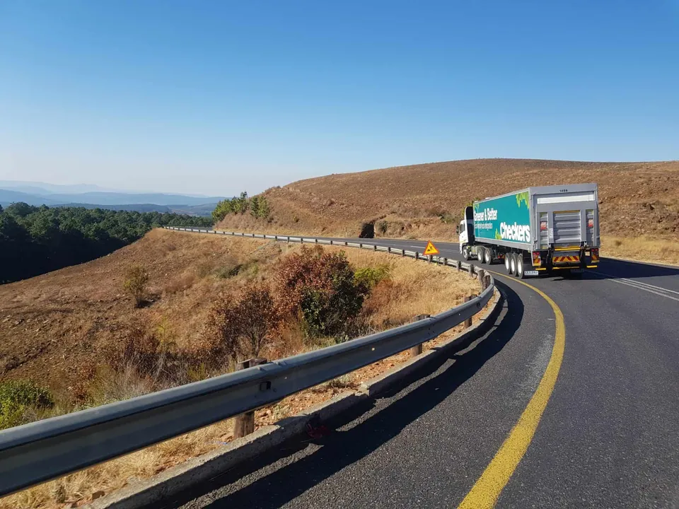 Bret Day Moving Co. truck on the road